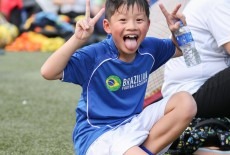 Tinytots Playing Soccer Football Kids Class Coach Field have fun make friends Kingston International School Lower Primary Kowloon